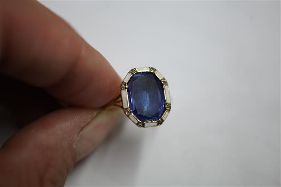 An attractive, gold, sapphire diamond and white enamel dress ring, size N